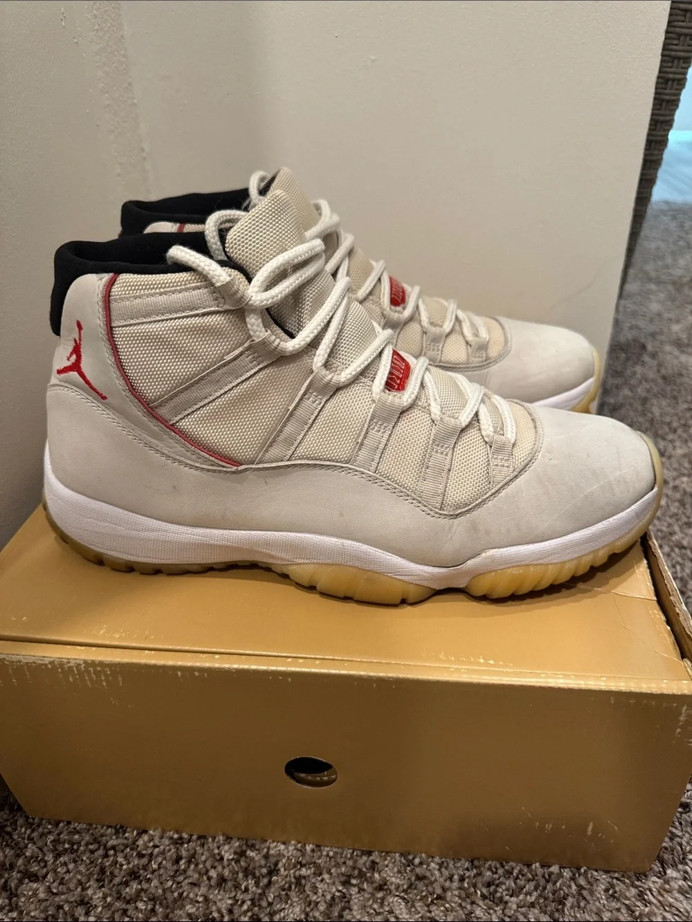 Jordan 11 Men's High-Top Sneakers in Off-White, Gum & Red Accents